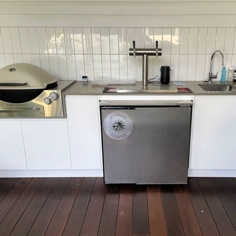 Kegerator | Solstace Indoor/Outdoor | Everything Needed Bundle showing kegerator installed under a bench